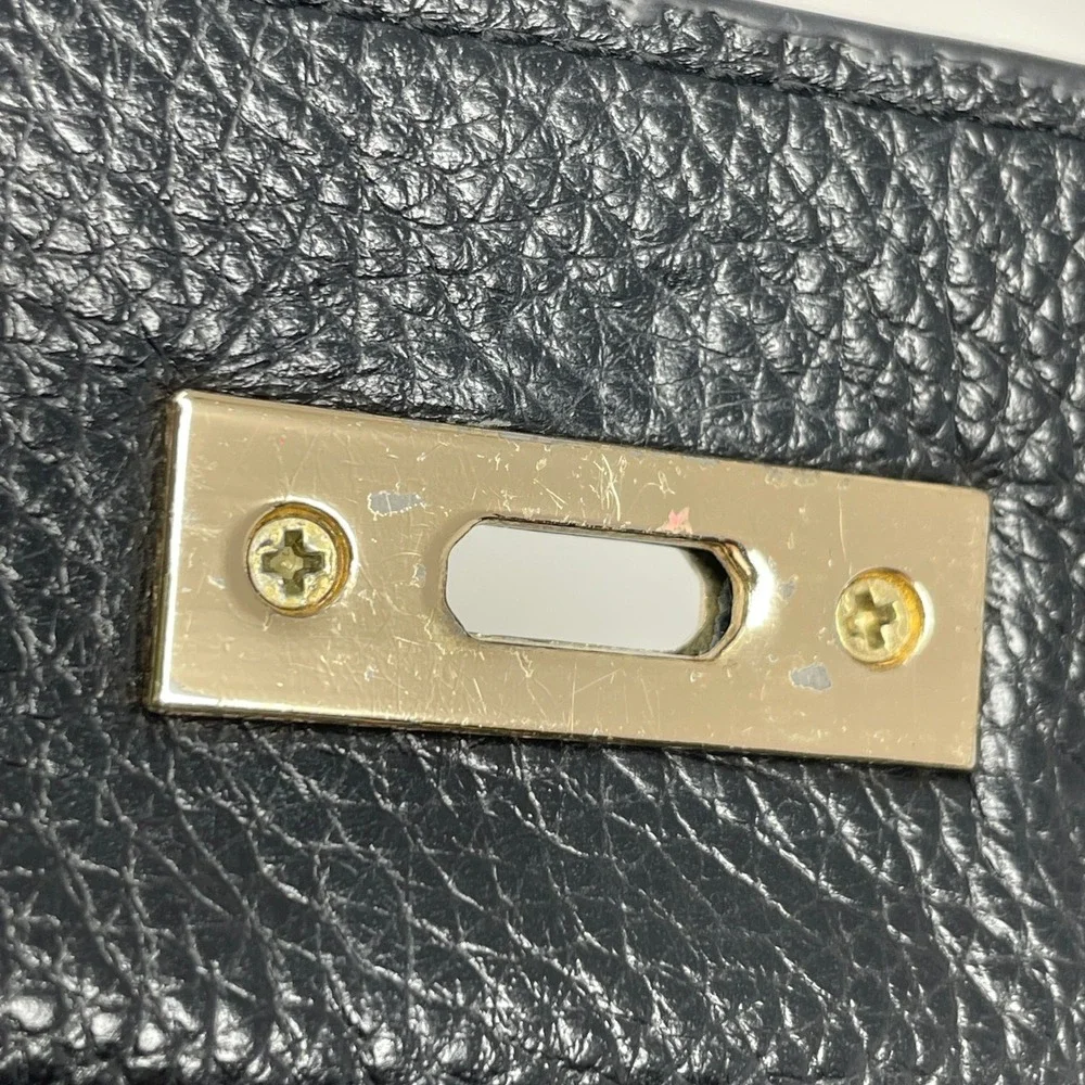 Zenith Black Pebbled Leather Clutch Bag Gold Turn Lock Hardware Handle Handbag